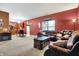 Relaxing room with comfortable sofas, with view to the kitchen and dining area at 3844 Kilburn Ct, Indianapolis, IN 46228