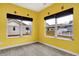 Yellow sunroom featuring two large windows with outside views at 3844 Kilburn Ct, Indianapolis, IN 46228