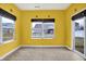 Bright sunroom with multiple windows and glass door, perfect for enjoying natural light at 3844 Kilburn Ct, Indianapolis, IN 46228