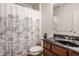 Updated bathroom with modern fixtures and stylish shower curtain, providing a clean and contemporary feel at 3880 Heathfield Ct, Zionsville, IN 46077