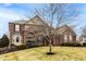 Charming two-story brick home with well-maintained landscaping and a classic architectural design at 3880 Heathfield Ct, Zionsville, IN 46077