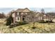 Aerial front exterior showcasing landscaping, brick facade, and an inviting entrance at 3880 Heathfield Ct, Zionsville, IN 46077