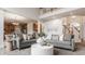 Open-concept living area featuring plush sofas, stylish decor, and an inviting atmosphere, perfect for Gathering gatherings at 3880 Heathfield Ct, Zionsville, IN 46077