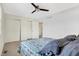 Bedroom features carpet, ceiling fan, double closets, and door to hallway at 3968 Creekwood Dr, Greenwood, IN 46142