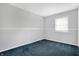 Bedroom with freshly painted light gray walls, white trim, and carpet at 3968 Creekwood Dr, Greenwood, IN 46142