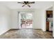 Bright dining area with sliding glass door access to the wooden back deck at 3968 Creekwood Dr, Greenwood, IN 46142