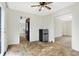 Open dining room leading into the kitchen; black refrigerator at 3968 Creekwood Dr, Greenwood, IN 46142
