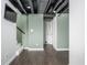 Finished basement offering extra living space with painted ceiling and access to a staircase at 4212 Broadway St, Indianapolis, IN 46205