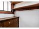 Closet with built-in wooden dresser and shelves at 4212 Broadway St, Indianapolis, IN 46205