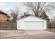 White detached garage with plenty of parking space at 4212 Broadway St, Indianapolis, IN 46205
