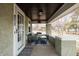 Inviting front porch featuring comfortable seating, stylish decor, and a relaxing ambiance for outdoor enjoyment at 4212 Broadway St, Indianapolis, IN 46205