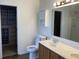 Bathroom with double sink, vanity, mirror, toilet, and walk-in closet at 457 Prince Dr, Greenwood, IN 46142