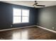 Bright bedroom features laminate wood flooring and ample natural light at 457 Prince Dr, Greenwood, IN 46142