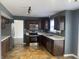 Updated kitchen with stainless steel appliances and modern cabinets at 457 Prince Dr, Greenwood, IN 46142