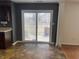Bright kitchen featuring sliding glass door leading to outdoor space and backyard at 457 Prince Dr, Greenwood, IN 46142