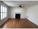 Spacious living room with hardwood floors and a cozy fireplace at 457 Prince Dr, Greenwood, IN 46142