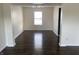 Bright living room with wood floors and ample natural light at 457 Prince Dr, Greenwood, IN 46142