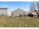 Flat backyard features a patio, grill and full fencing at 4704 Whitview Ln, Indianapolis, IN 46237