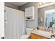 Well-maintained bathroom with shower/tub combination, single sink vanity, and neutral wall color at 4704 Whitview Ln, Indianapolis, IN 46237