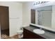 Full bathroom featuring vanity with storage, large mirror, and shower, combining style and functionality at 476 Haywood Dr, Greenfield, IN 46140