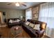 Cozy living room with two sofas, hardwood floors, and natural light creating a welcoming space at 5068 W 10Th St, Indianapolis, IN 46224