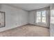 Neutral bedroom features neutral walls, carpet, and a window for natural light at 5451 Buttonwood Dr, Noblesville, IN 46062