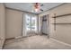 Bedroom with neutral walls, carpet, closet, a ceiling fan, and a window for natural light at 5451 Buttonwood Dr, Noblesville, IN 46062