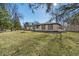 Inviting front yard showcases a well-maintained lawn and mature trees at 5451 Buttonwood Dr, Noblesville, IN 46062