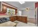 Warm kitchen features wood cabinets, updated appliances, and ample counter space at 5451 Buttonwood Dr, Noblesville, IN 46062