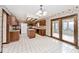 Spacious kitchen with granite countertops, stainless steel appliances, and tiled floors at 5519 Fall Creek Rd, Indianapolis, IN 46220