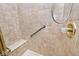 Shower features tile walls, a grab bar, and a built-in seat at 5519 Fall Creek Rd, Indianapolis, IN 46220