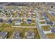 Picturesque neighborhood displaying an array of well-kept homes with verdant lawns and orderly streetscapes at 61 Larimar Way, Whiteland, IN 46184