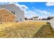 Generous backyard with a modern pergola and patio, enhancing outdoor enjoyment at 61 Larimar Way, Whiteland, IN 46184