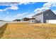 Expansive backyard with a pergola and concrete patio, offering plenty of room to enjoy at 61 Larimar Way, Whiteland, IN 46184