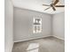 Cozy bedroom with carpet flooring, a window for natural light, and a ceiling fan at 61 Larimar Way, Whiteland, IN 46184