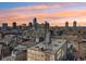 Breathtaking sunset view of the city skyline, seen from the building's rooftop and water tower at 611 N Park Ave # 414, Indianapolis, IN 46204