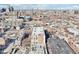 Aerial view showcases the rooftop details amidst a modern urban environment under a clear sky at 611 N Park Ave # 414, Indianapolis, IN 46204