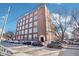 Charming brick building with large windows, offering ample natural light and classic architectural design at 611 N Park Ave # 414, Indianapolis, IN 46204