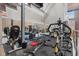 Fitness center with various exercise machines and mirrored walls at 611 N Park Ave # 414, Indianapolis, IN 46204