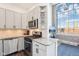Modern kitchen featuring stainless steel appliances and eat-in counter at 611 N Park Ave # 414, Indianapolis, IN 46204