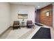 Lobby area with seating and artwork, complemented by unique architectural elements at 611 N Park Ave # 414, Indianapolis, IN 46204