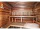Relax in the wood paneled sauna with built-in benches, creating a tranquil retreat in your own home at 611 N Park Ave # 414, Indianapolis, IN 46204