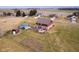 Aerial view of the home showing the expansive property and features including a pool and barn at 6880 W Jennifer Dr, Greenfield, IN 46140