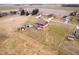 Aerial view of the home and backyard with a pool, barn, and large open space at 6880 W Jennifer Dr, Greenfield, IN 46140
