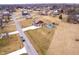 Aerial view of a neighborhood featuring a home with a large backyard, above ground pool and storage barn at 6880 W Jennifer Dr, Greenfield, IN 46140
