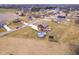 Aerial view of the backyard featuring a pool, storage barn, and spacious yard at 6880 W Jennifer Dr, Greenfield, IN 46140