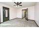 Spacious bedroom features plush carpeting, ceiling fan, and neutral wall colors at 6880 W Jennifer Dr, Greenfield, IN 46140