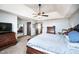 Bright main bedroom showcases dual dressers and an adjoining bathroom and closets at 6880 W Jennifer Dr, Greenfield, IN 46140