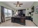 Executive home office featuring a large desk, chandelier, and natural light at 6880 W Jennifer Dr, Greenfield, IN 46140