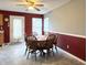 Cozy dining area next to the kitchen, with large windows for natural light at 6896 Maywood Cir, Avon, IN 46123